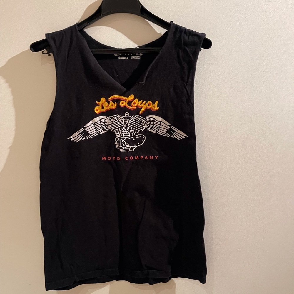 3/15$ Moto company tank​
